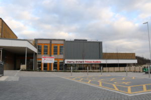 Photo of the exterior of the Cherry Orchard Primary Academy building.